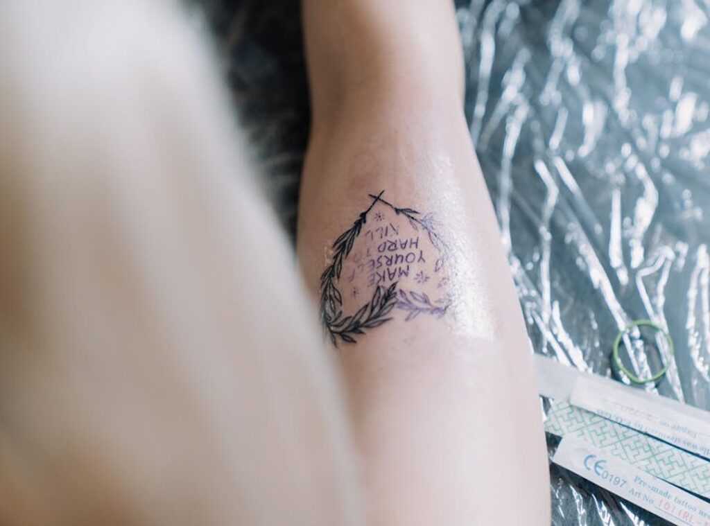 olijftak tattoo betekenis