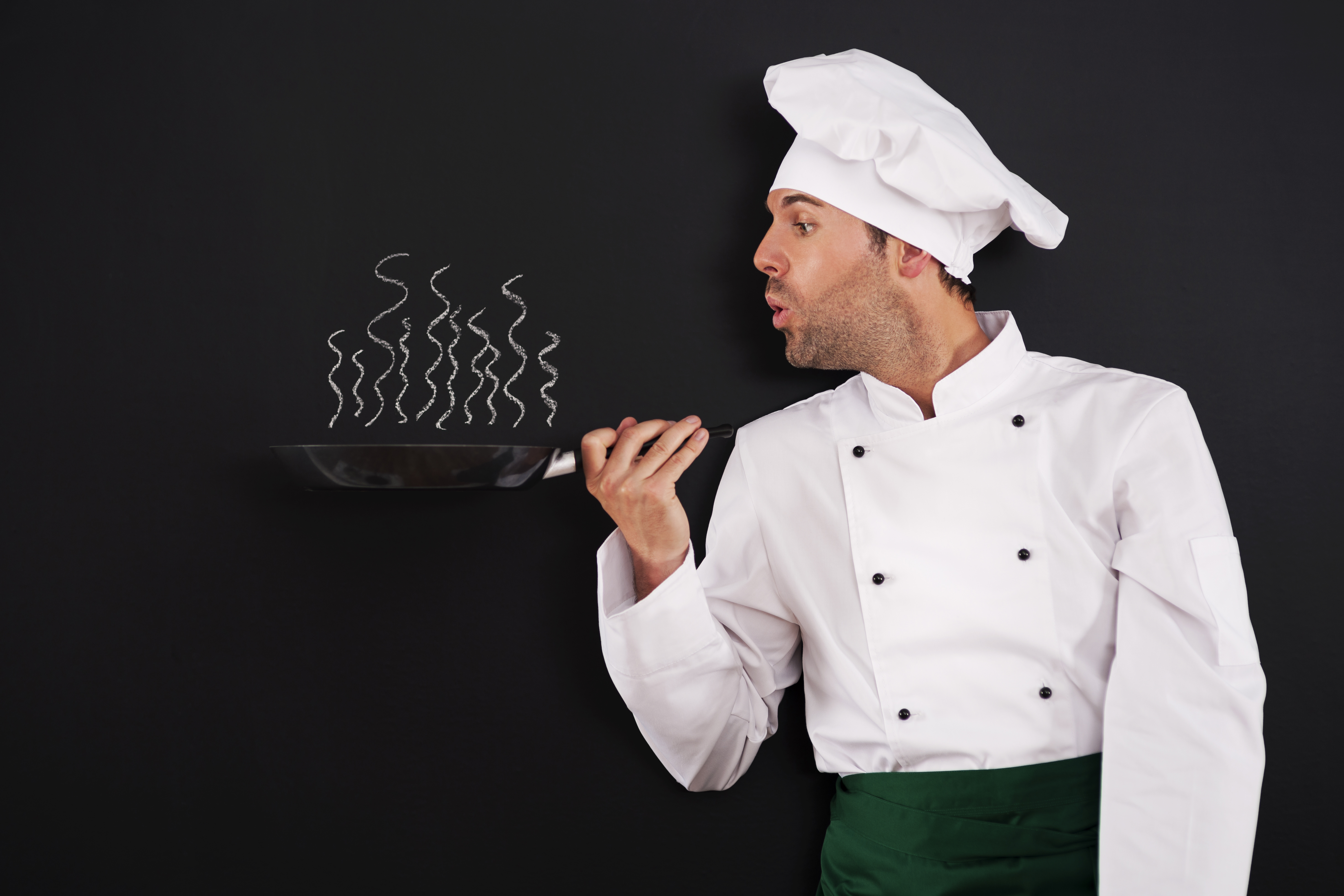 chef-blowing-smoke-from-pan